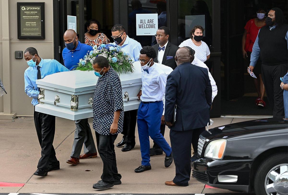 After the funeral, pallbearers carry Rosetta Thornton’s casket to a hearse on Saturday, Sept. 4, 2021, at Graceway Church in Raytown. Thornton was Kevin Strickland’s mother. Strickland, who Jackson County prosecutors say was wrongly convicted in a 1978 triple murder, was not able to attend his mother’s funeral Saturday.