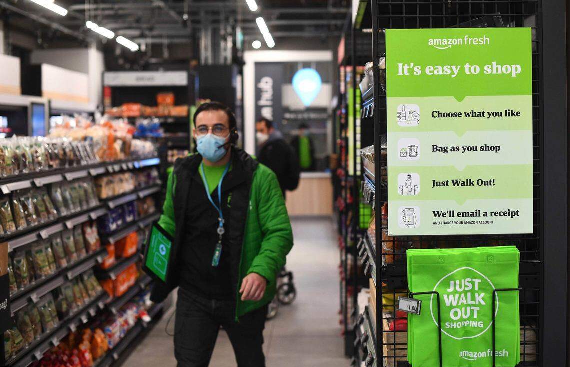 This Amazon Fresh grocery store opened in London earlier this month, where a sign tells shoppers how to pick up items and walk out of the store, contactless, without the need to check out. Customers can a QR code on their way into the store, with cameras and technology identifying the items that shoppers take from the shelves and their account automatically paid.