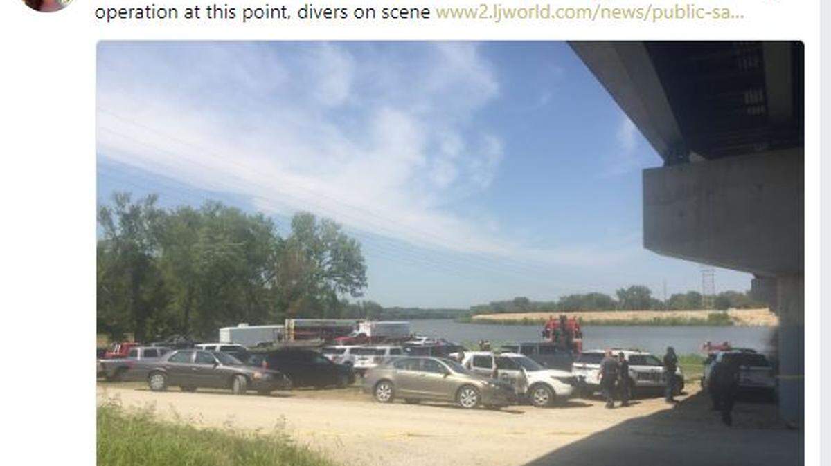 A tweet from Lawrence Journal-World reporter Sara Shepherd shows the scene Friday afternoon at the Kansas River, where a 5-year-old girl’s body was found after her mother and brother were rescued alive from the water. The mother was arrested on charges of murder, Lawrence police said Saturday.