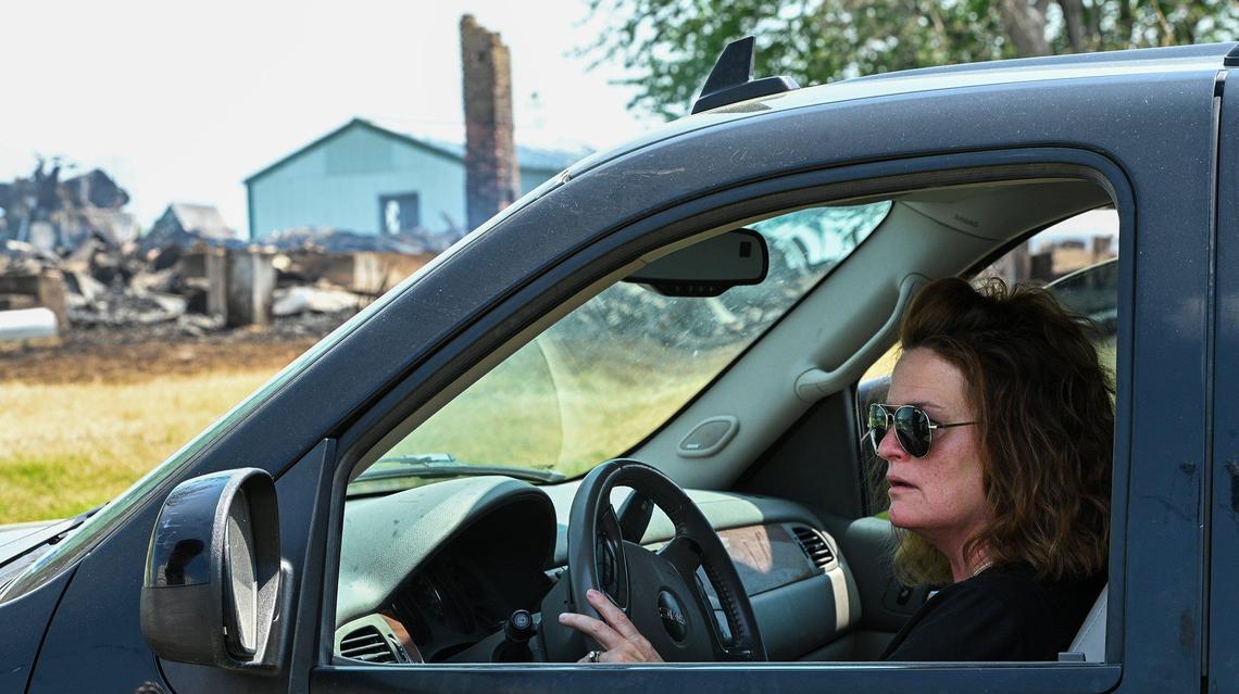 Christal Hicks, granddaughter of Lorene Fickess, 96, visited the home her grandparents had lived in since 1958 on Wednesday, May 11, 2022. Fickess was killed in one of three fires Tuesday near Polo in Caldwell County. The town is about 50 miles northeast of Kansas City.