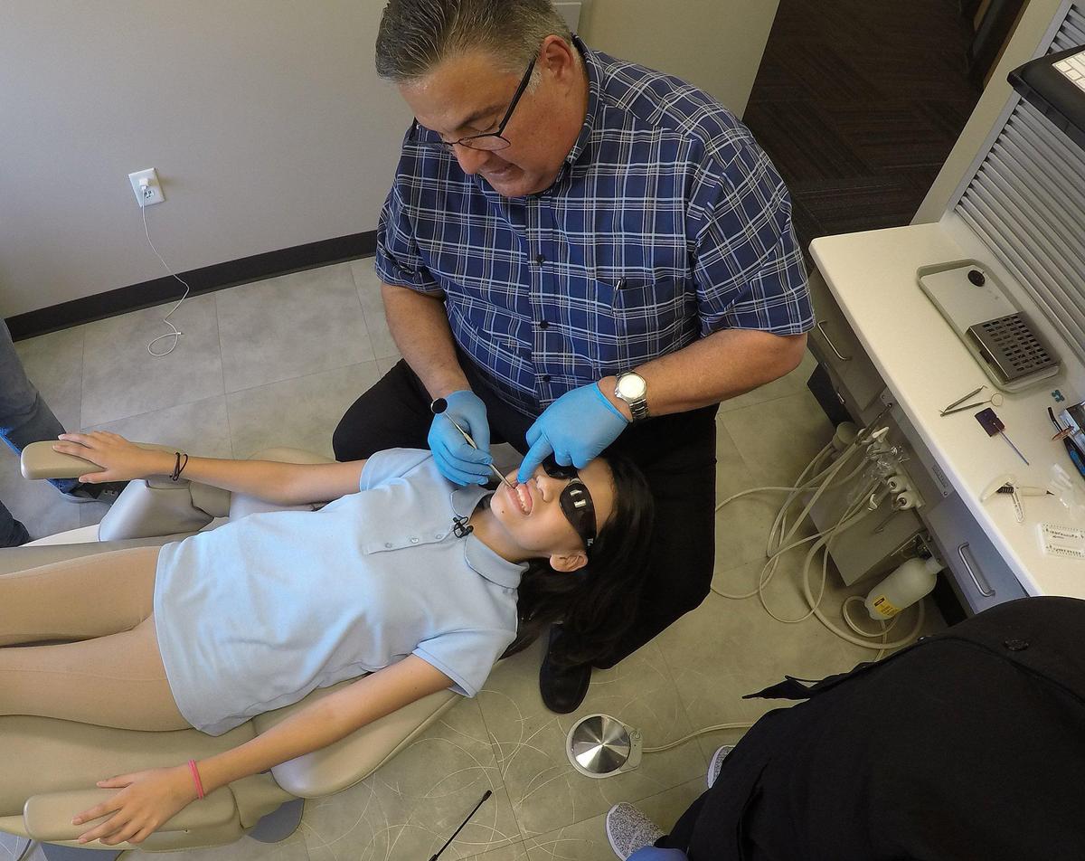 Don Sanchez at Burleson Orthodontics in Kansas City is one of 850 orthodontists nationwide who donate their services to children like Yuliana Alvarado, whose families can’t afford the full price of braces. Sanchez works through the nonprofit Smiles Change Lives, which offers braces for $650.