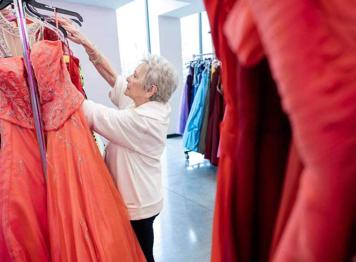 Woods Chapel United Methodist Church’s Prom Boutique is run by a small army of volunteers. It’s estimated that it takes around 200 people to put on the event each year. Some do alterations, others help with measurements and tracking down the right items.