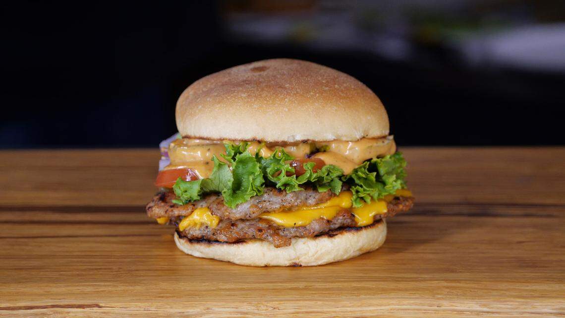 The Strip’s Chicken pork burger is made with 100% whole pork loin.