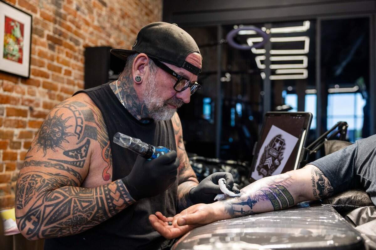 Lee Harding, Manchester native and tattoo artist at Evolve Tattoo Collective on Tuesday, June 9, 2026.