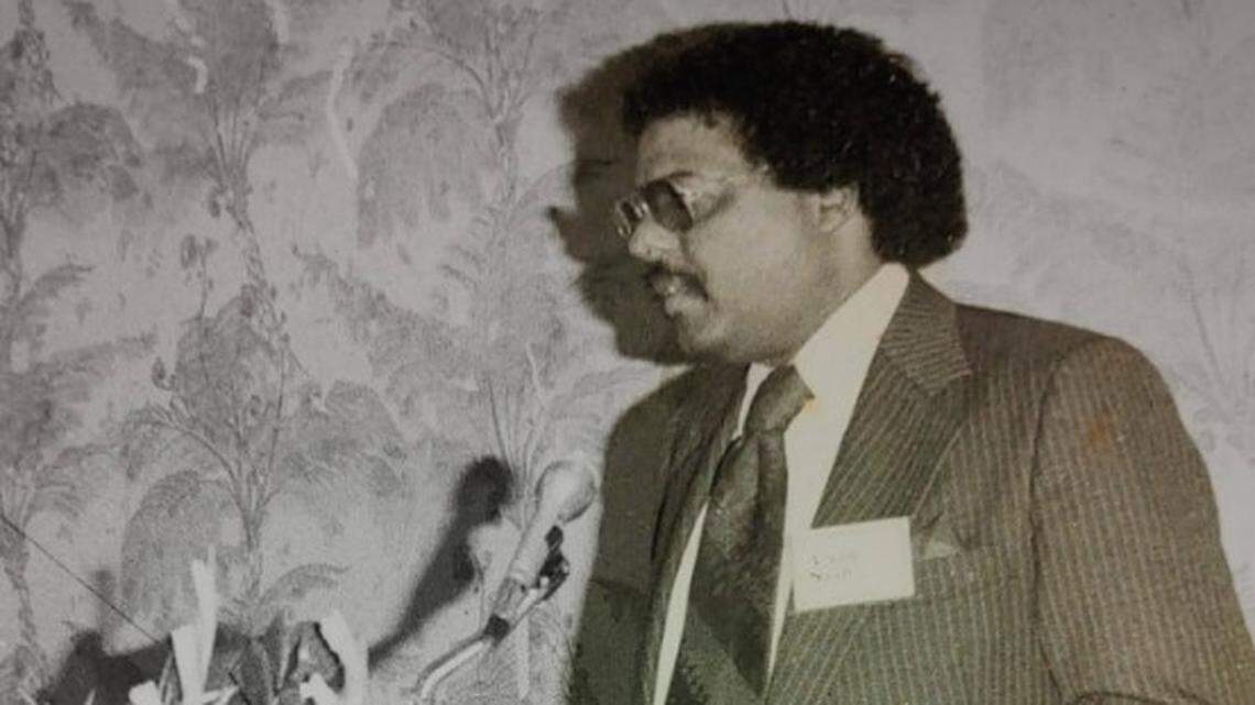 Alvin Nash is seen standing at a podium in an undated photo.