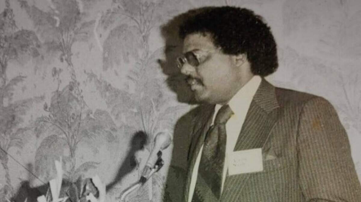Alvin Nash is seen standing at a podium in an undated photo.