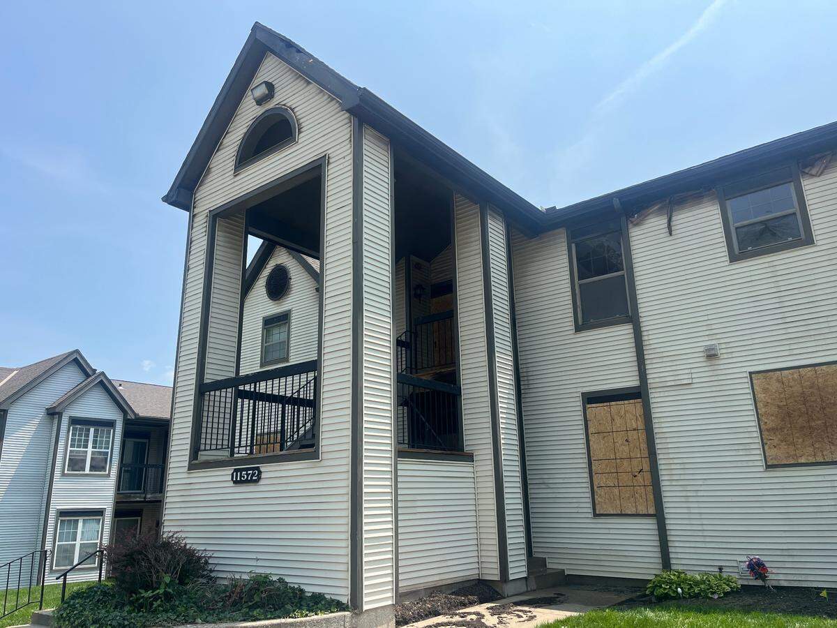 Crews were seen boarding up entrances and windows to a Coach House apartment building, located in the 11500 block of Holmes Road in South Kansas City, on Monday, June 2. The cause of the fire, which occurred late Sunday night, is under investigation by the Bomb and Arson Unit of the Kansas City Police Department.