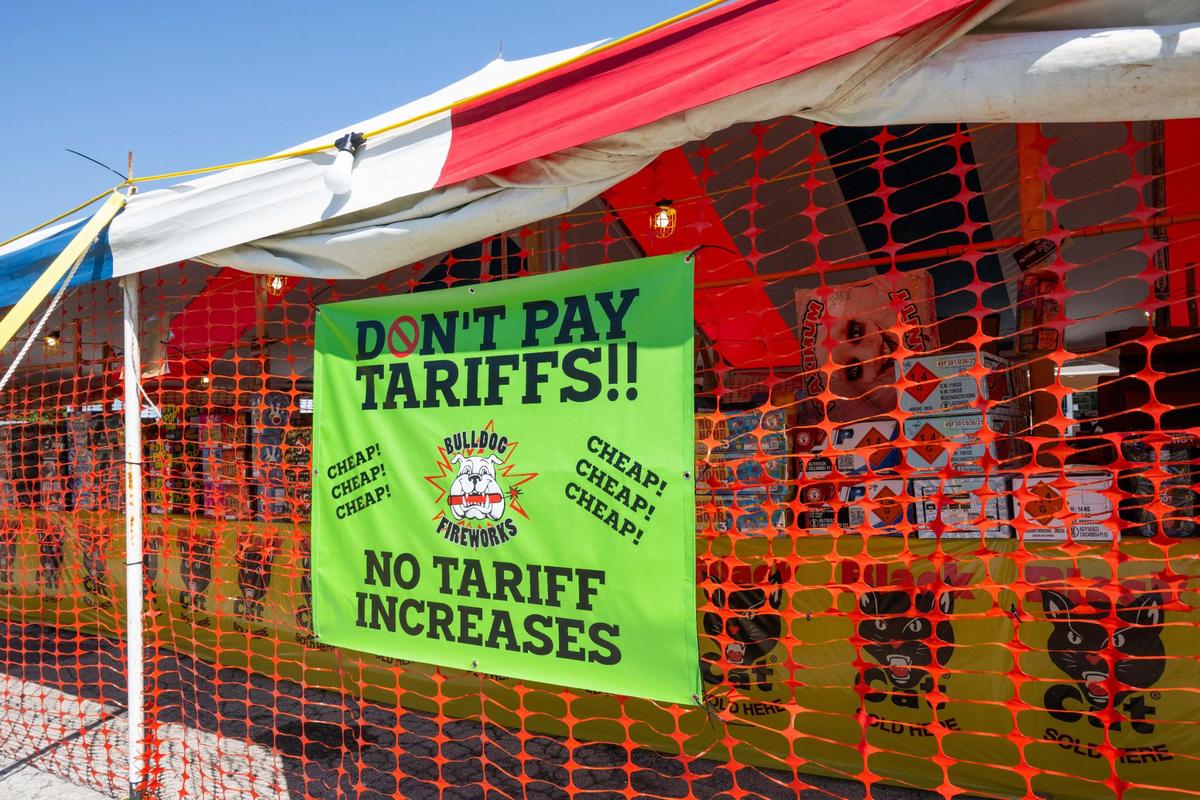 A sign against tariffs at Bull Dog’s Fireworks on the day before Independence Day in Riverside on Thursday, July 3, 2025. The majority of fireworks being sold at these stands are made in China.