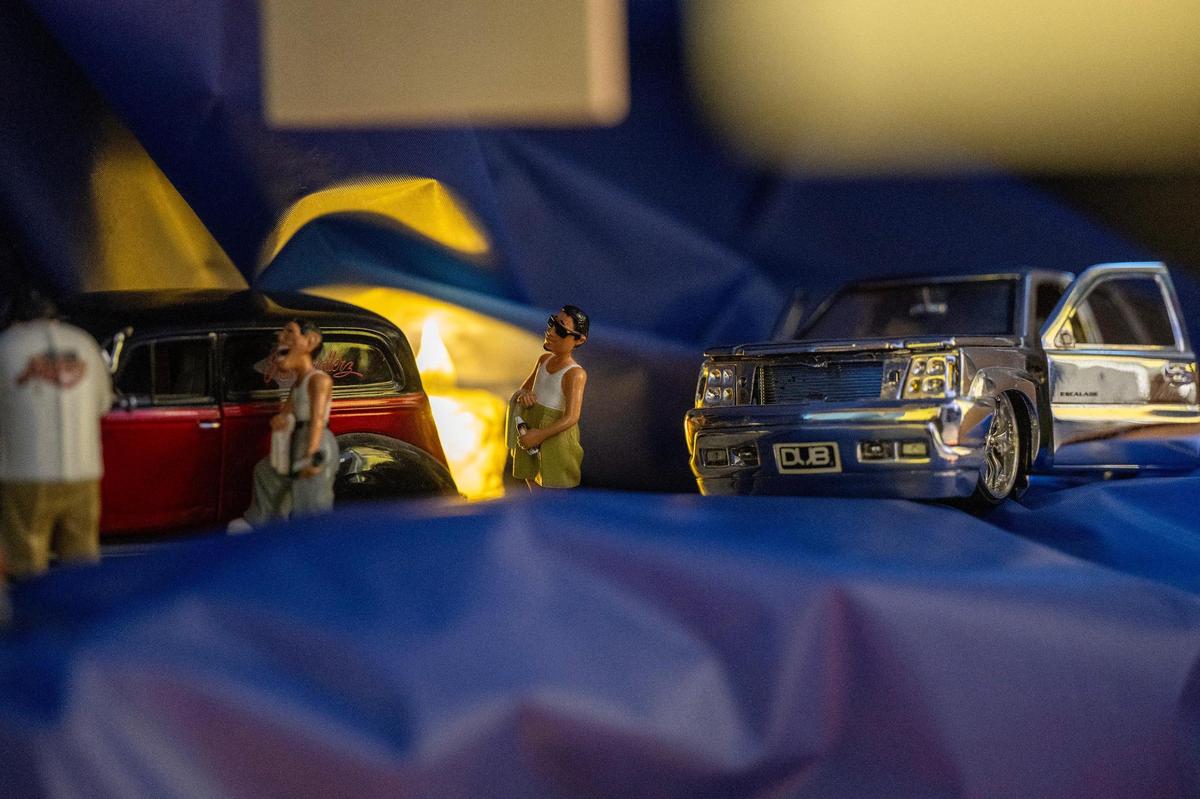 Small figurines are seen among the items in Pena’s Dia de los Muertos ofrenda.