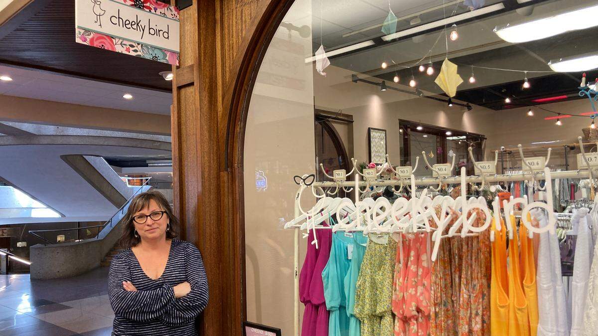 Stephanie Herbig, owner of Cheeky Bird clothing boutique in Crown Center, saw disappointing sales during the NFL Draft. She mainly blames $50 Crown Center parking for chasing customers away.