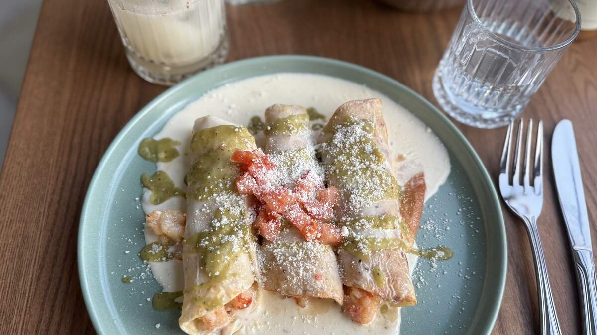 Crossroads Cantina offers cremaqueso enchiladas with grilled shrimp, white cheese sauce and avocado salsa.