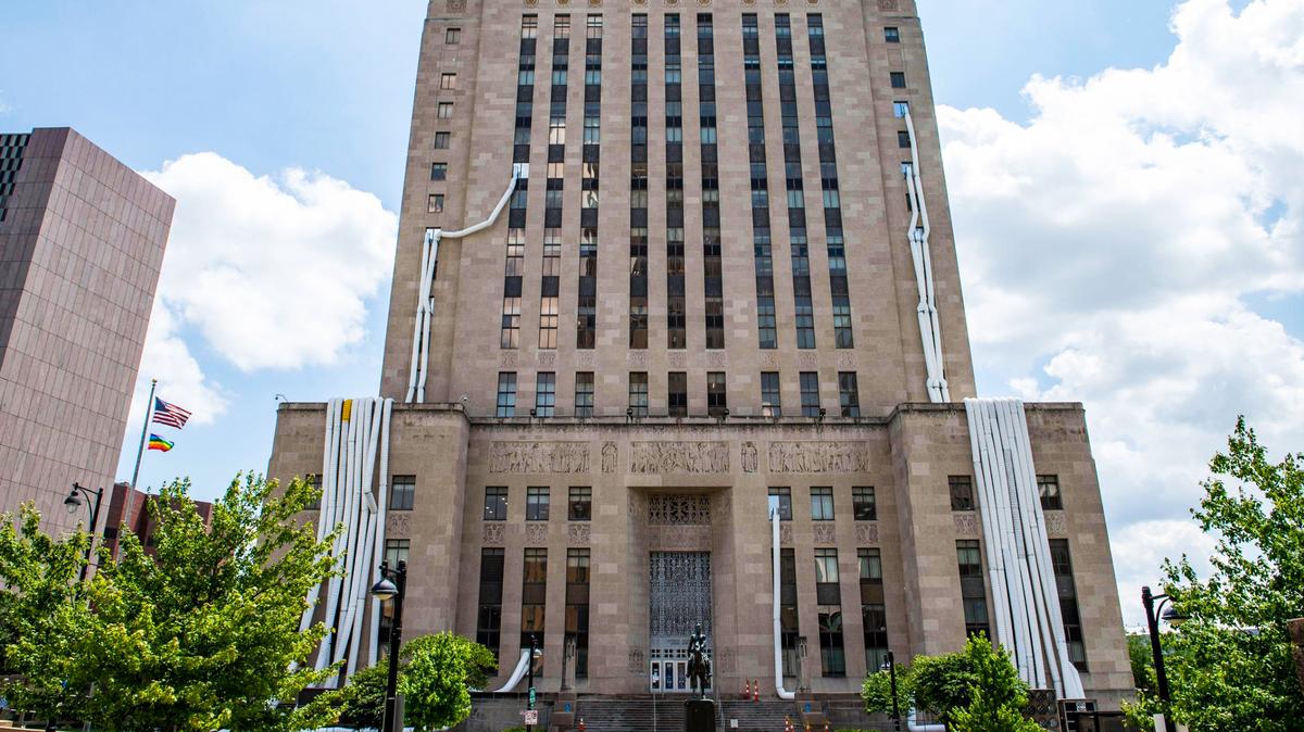 Tubes delivering cool air to a few select rooms snake up the exterior of the Jackson County Courthouse in Kansas City. Decades of decay and lack of proper maintenance forced the county to shut down the air conditioning system while repairs are made this month.