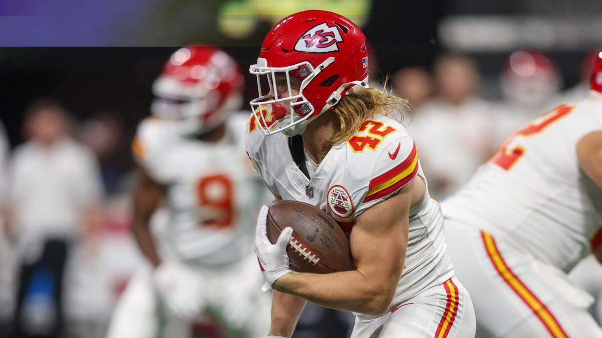 Kansas City Chiefs running back Carson Steele picks up yardage against the Atlanta Falcons during Sunday night’s game at Mercedes-Benz Stadium.