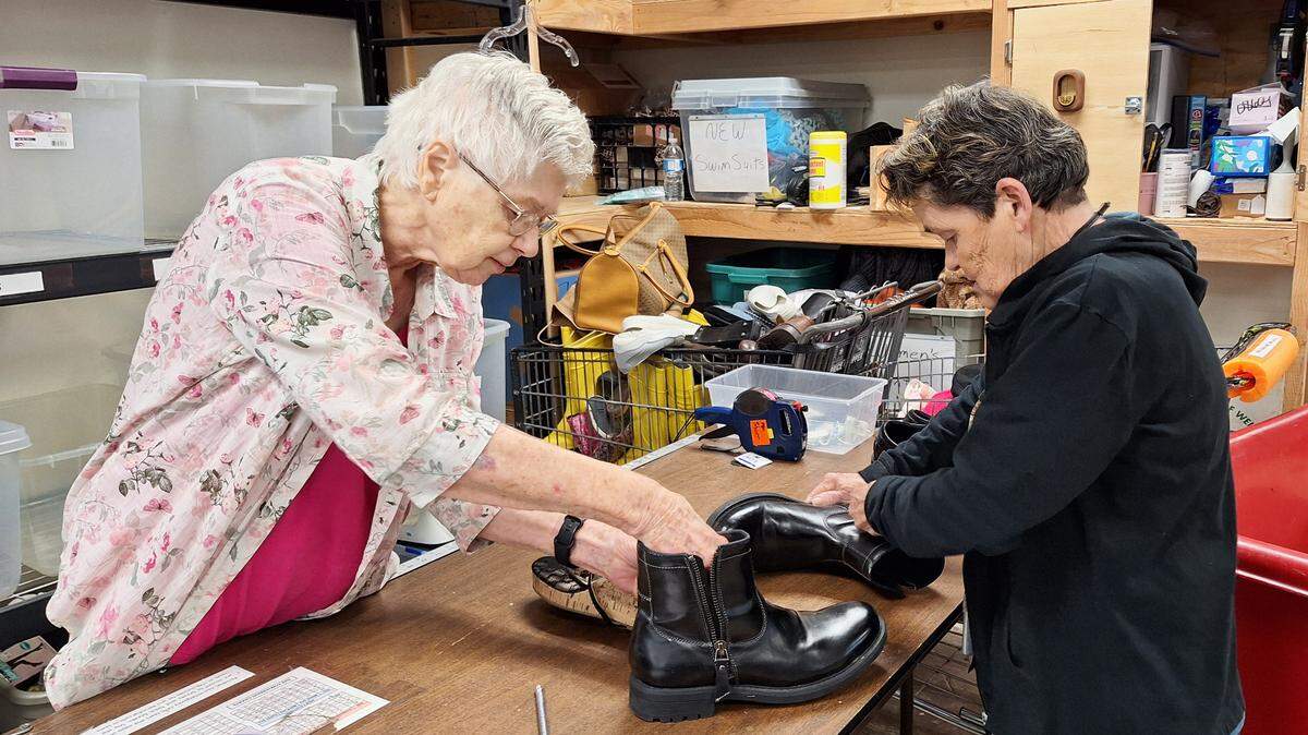 Sister Jane Falke, left, seen here with Dee McMillan at TurnStyles, a Catholic Charities thrift store in Mission, celebrates 70 years as a Catholic nun this year.