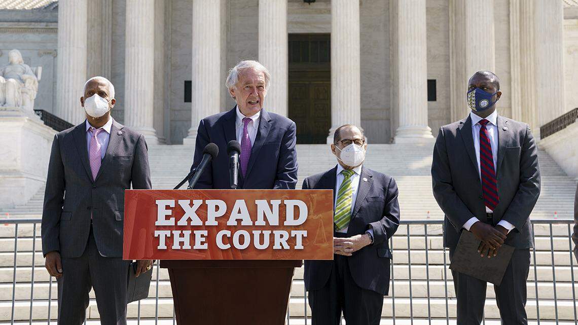 From left, Rep. Hank Johnson, D-Ga., Sen. Ed Markey, D-Mass., House Judiciary Committee Chairman Jerrold Nadler, D-N.Y., and Rep. Mondaire Jones, D-N.Y., hold a news conference outside the Supreme Court to announce legislation to expand the number of seats on the high court, on Capitol Hill in Washington, Thursday, April 15, 2021.