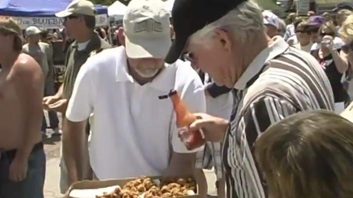 At the Testicle Festival in Olean, Missouri, visitors can douse the deep-fried turkey balls in hot sauce, ketchup or just eat them plain.