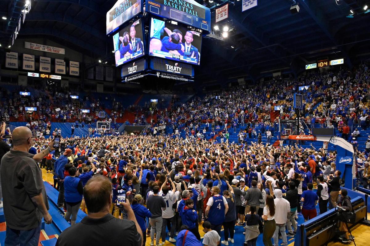 Jayhawk fans stormed the court and celebrated a historic comeback victory in Allen Fieldhouse as Kansas came back from a 15 point deficit to defeat North Carolina for the NCAA National Championship in New Orleans on Monday, April 4, 2022.