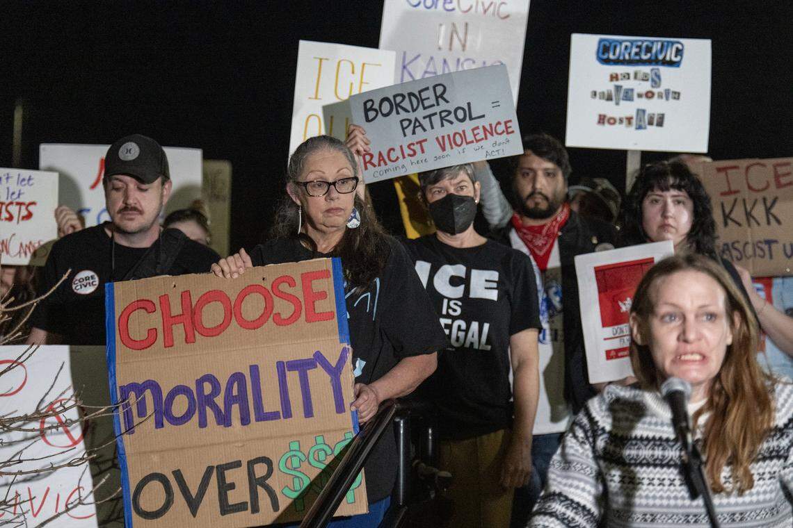 Ellen Johnson of Topeka, right, denounced the Leavenworth city commission which approved a zoning permit Tuesday, March 10, 2026, that allows a private prison company, CoreCivic, to reopen its shuttered prison on the outskirts of town as an ICE detention center. 