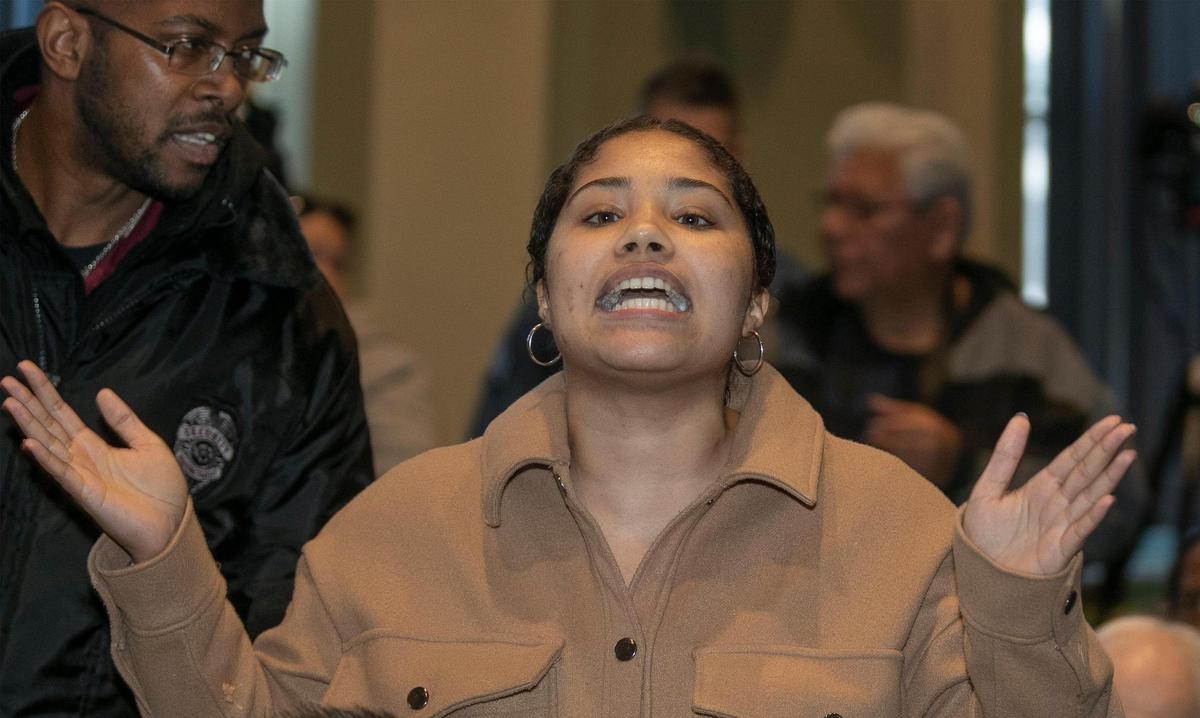 Amaia Cook of Decarcerate KC spoke out of turn and was escorted out by police during a public forum with the three KCPD Chief of Police finalists Saturday, December 10, 2022 at the Robert J. Mohart Multipurpose Center, 3200 Wayne Avenue, Kansas City, MO. &nbsp;