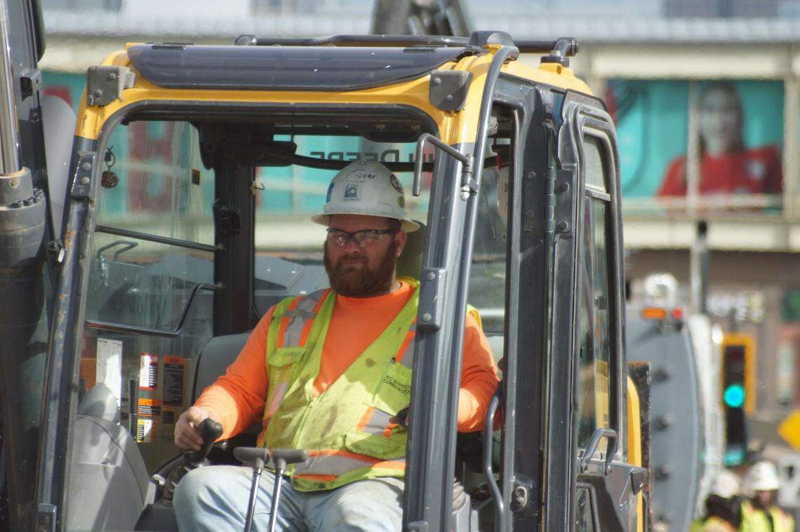 A worker operates an excavator near Union Station as part of the Kansas City Streetcar’s southern extension. The major construction work for the extension is expected to be completed by the end of 2024.
