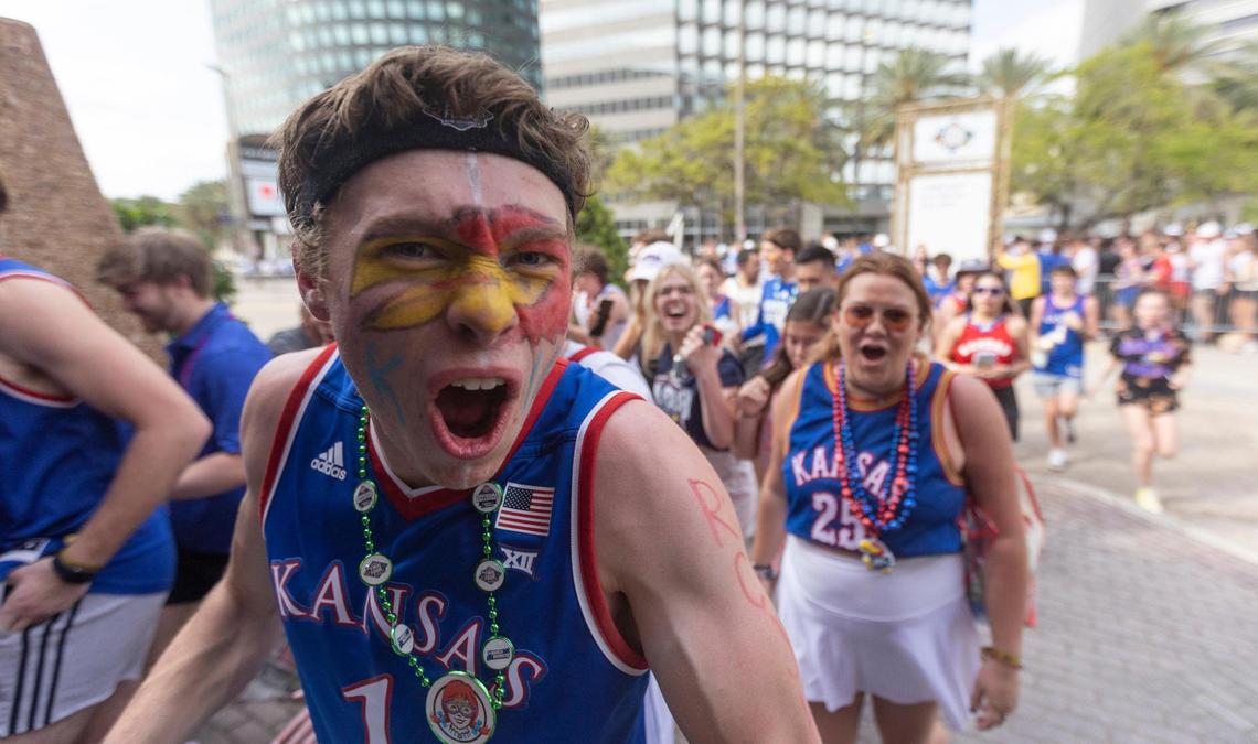 Kansas students enter the Superdome in New Orleans on Monday night before the start of the national championship game between Kansas and North Carolina.