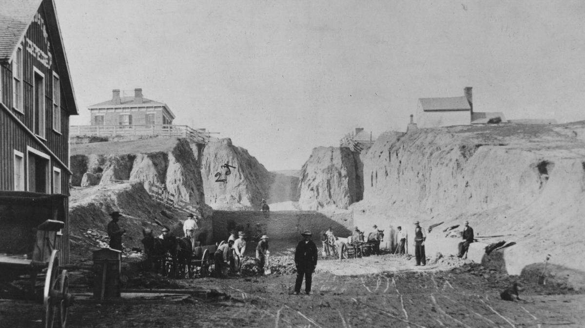 Walnut Street had a totally different look in 1868 than it does in 2023. This view looks north between Second and Third streets.