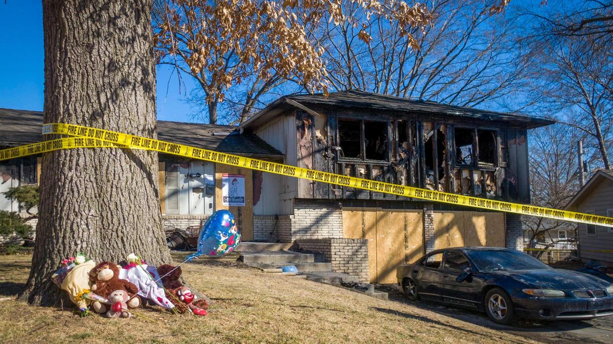 A memorial sits outside of 10502 West 69th Ter., in Shawnee, where an infant died in a house fire early Sunday, Feb. 13, 2022, in Shawnee, Kansas.