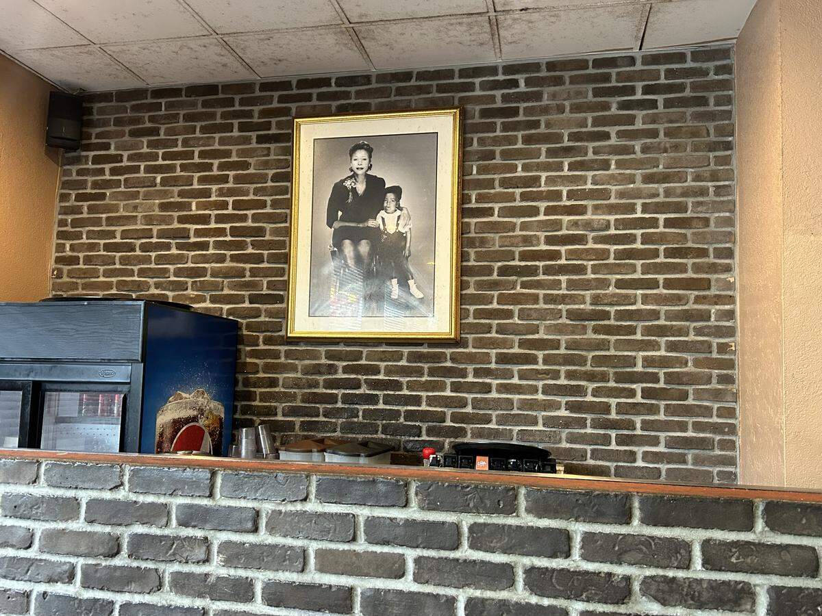Willis’ restaurant pays homage to her late mother, including this large framed photo of the two near the entrance.