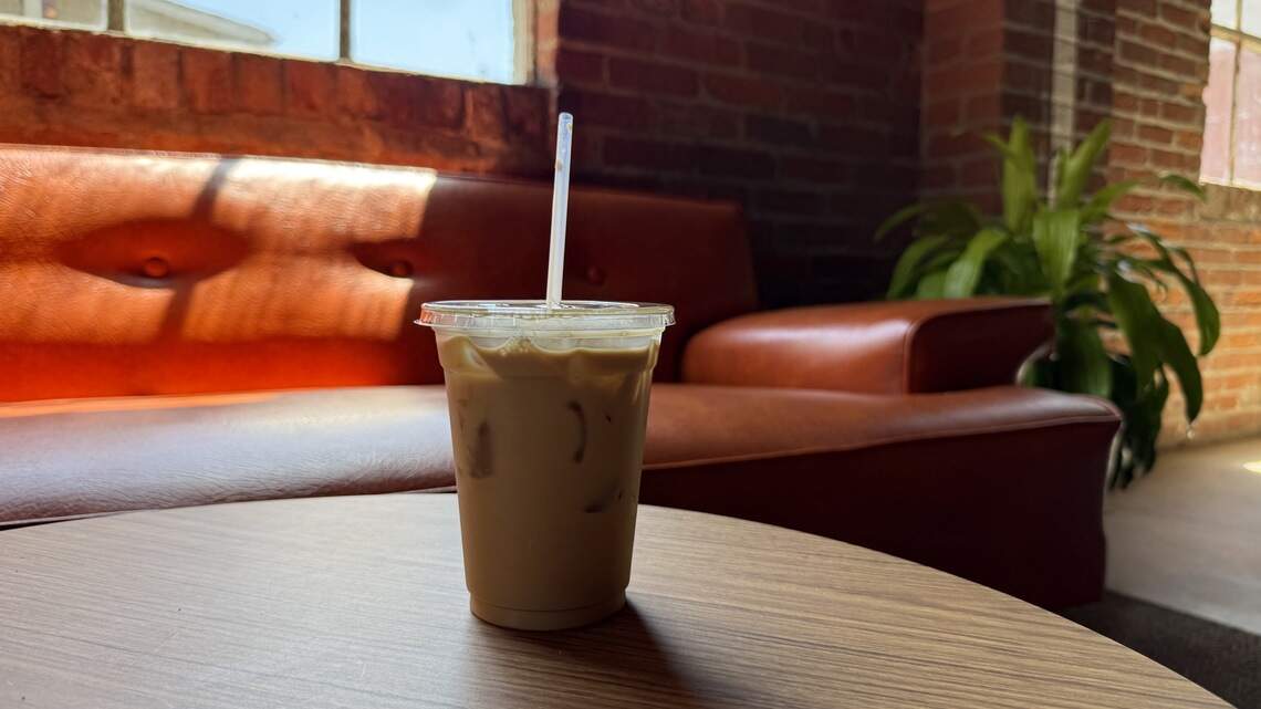 Johnson County coffee shop, roaster opens. It’s in a nearly century-old building