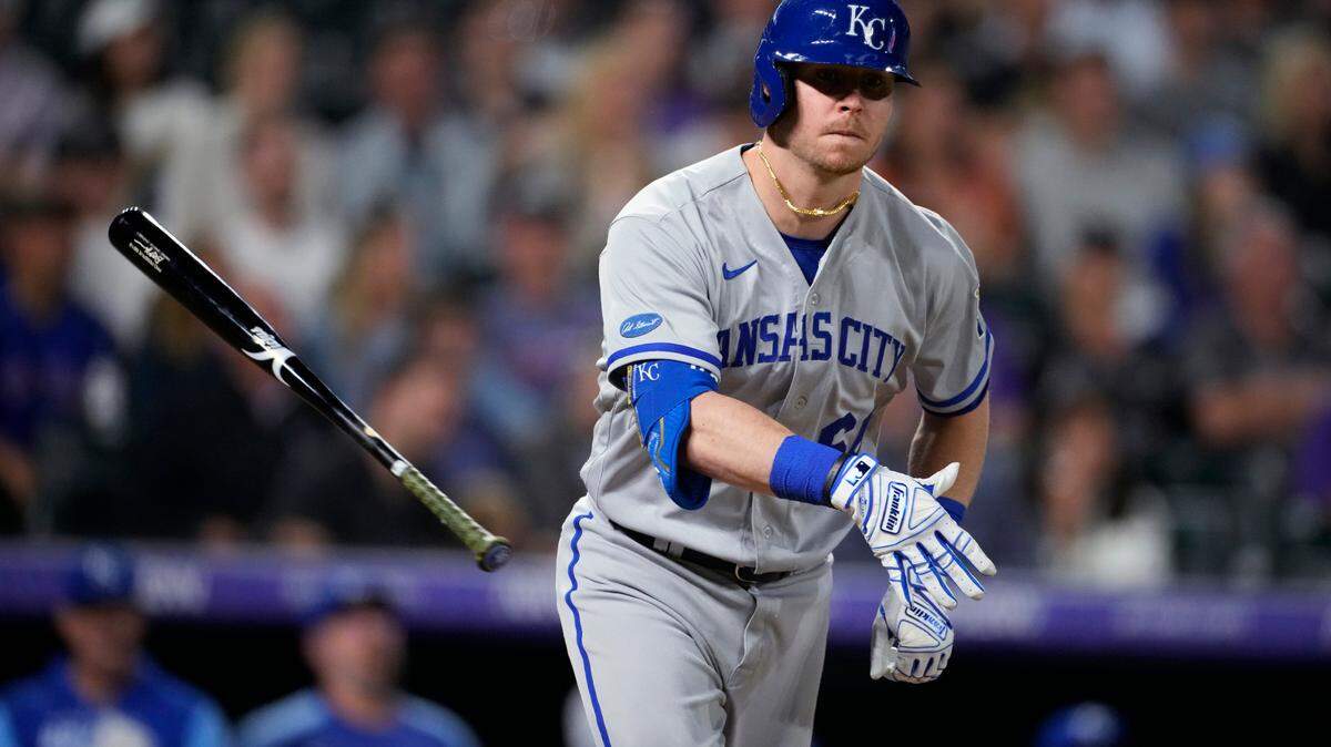 Kansas City Royals pinch-hitter Ryan O’Hearn tosses his bat after hitting a two-run home run off Colorado Rockies relief pitcher Carlos Estevez during the eighth inning of a baseball game Friday, May 13, 2022, in Denver.(AP Photo/David Zalubowski)
