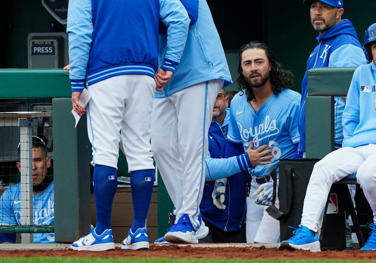 Kansas City Royals left fielder Jonathan India (6) reacts after being hit by a pitch during the ninth inning against the Cleveland Guardians at Kauffman Stadium on Mar 30, 2025 in Kansas City, Missouri, USA.
