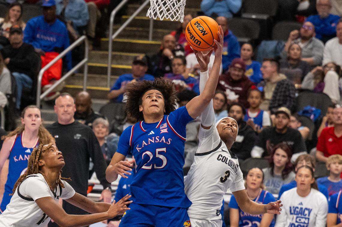 Colorado Buffaloes guard Desiree Wooten (3) blocks a shot by Kansas Jayhawks forward Jaliya Davis (25) during the second half of KU’s second-round game at the Big 12 Women's Basketball Tournament on Thursday, March 5, 2026, at T-Mobile Center in Kansas City.
