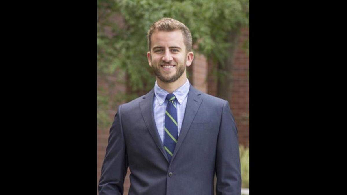 Justin Adrian, 33, resigned from the Shawnee City Council on Sept. 12, two days after he was placed on paid administrative leave from his teaching position at Olathe East High School.