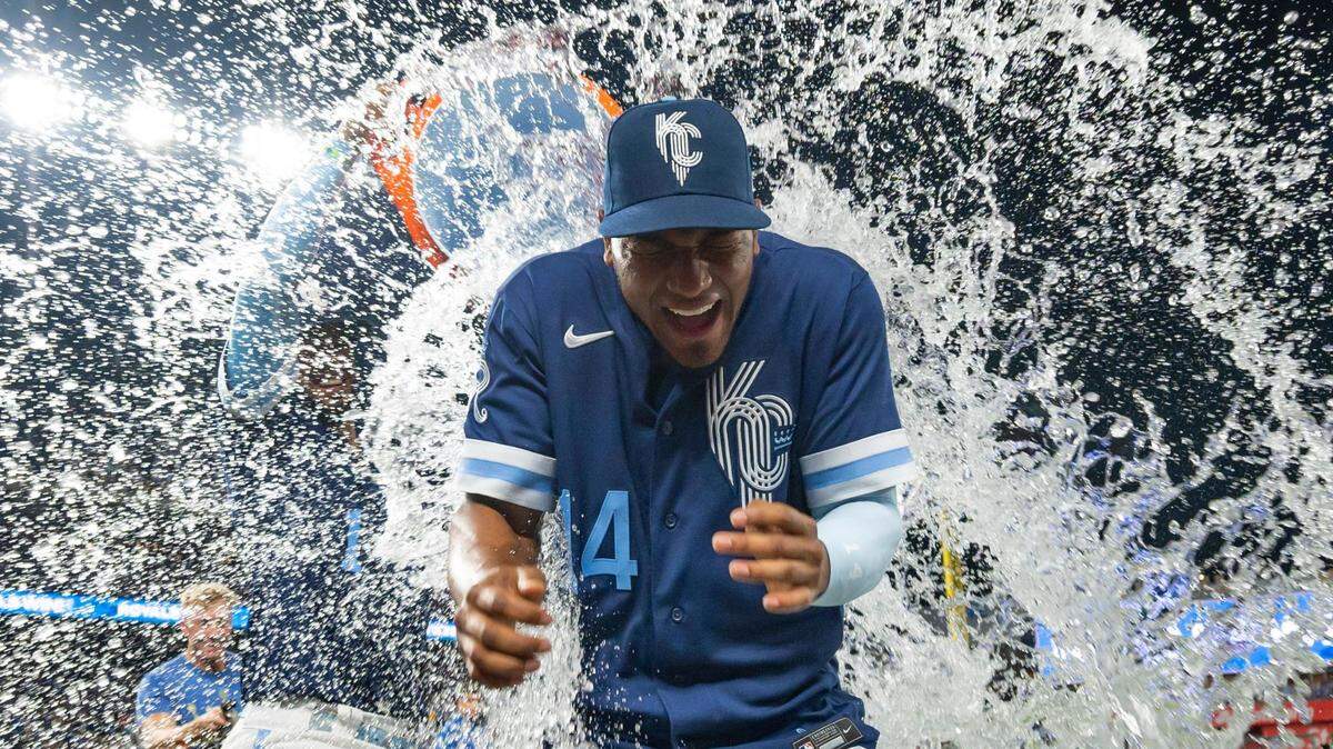 Royals right fielder Edward Olivares gets doused with water after the Kansas City Royals beat the Oakland Athletics 3-1 at Kauffman Stadium on June 24, 2022 in Kansas City.