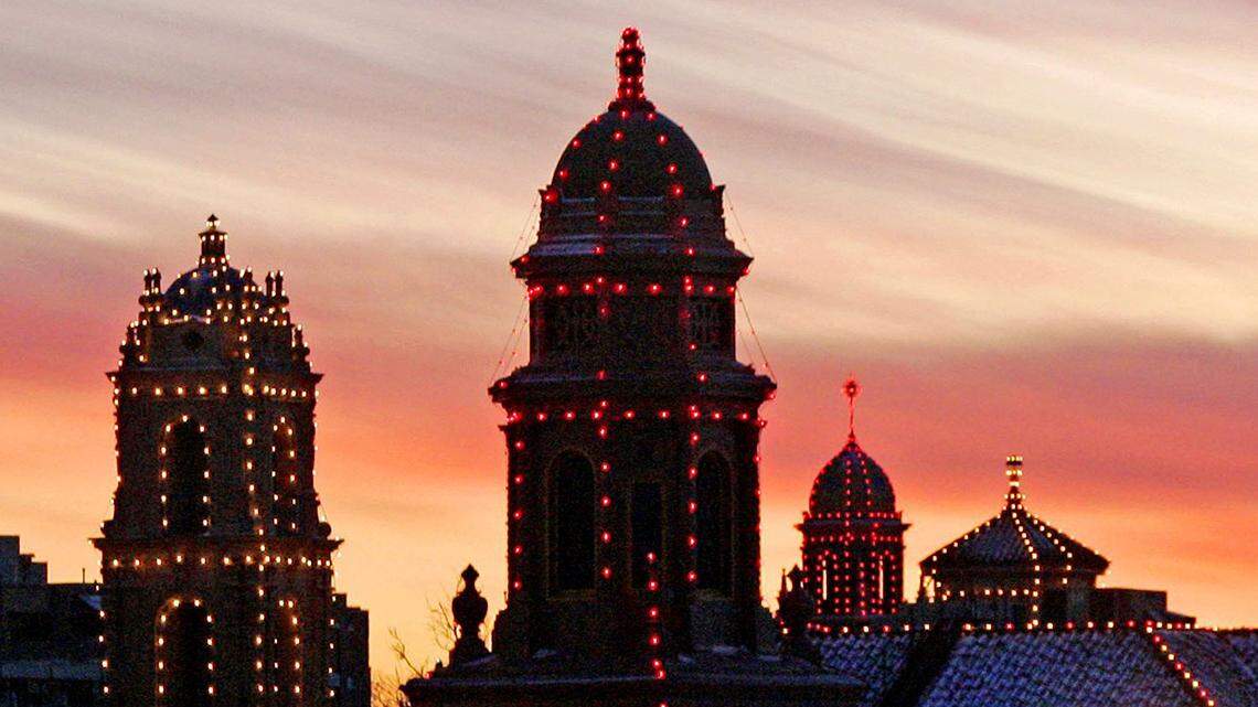 The Christmas Eve sunset and the lights on the Country Club Plaza brought their special colors to the season in Kansas City.