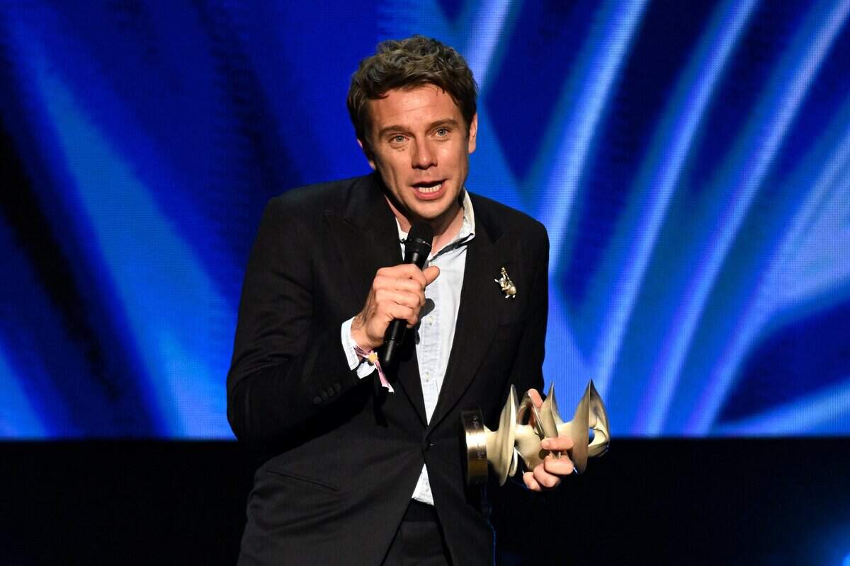 Jonathan Anderson accepts Designer of the Year award during The Fashion Awards 2024 presented by Pandora at Royal Albert Hall on December 02, 2024 in London, England.