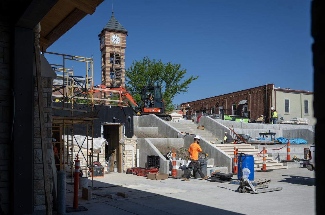 Work continues on the Clock Tower Landing and the Overland Park Farmers Market pavilion, a $34 million project underway in downtown Overland Park on Tuesday, April 21, 2026. The first farmers market is set to open at 7 a.m. Saturday, June 6, 2026. 