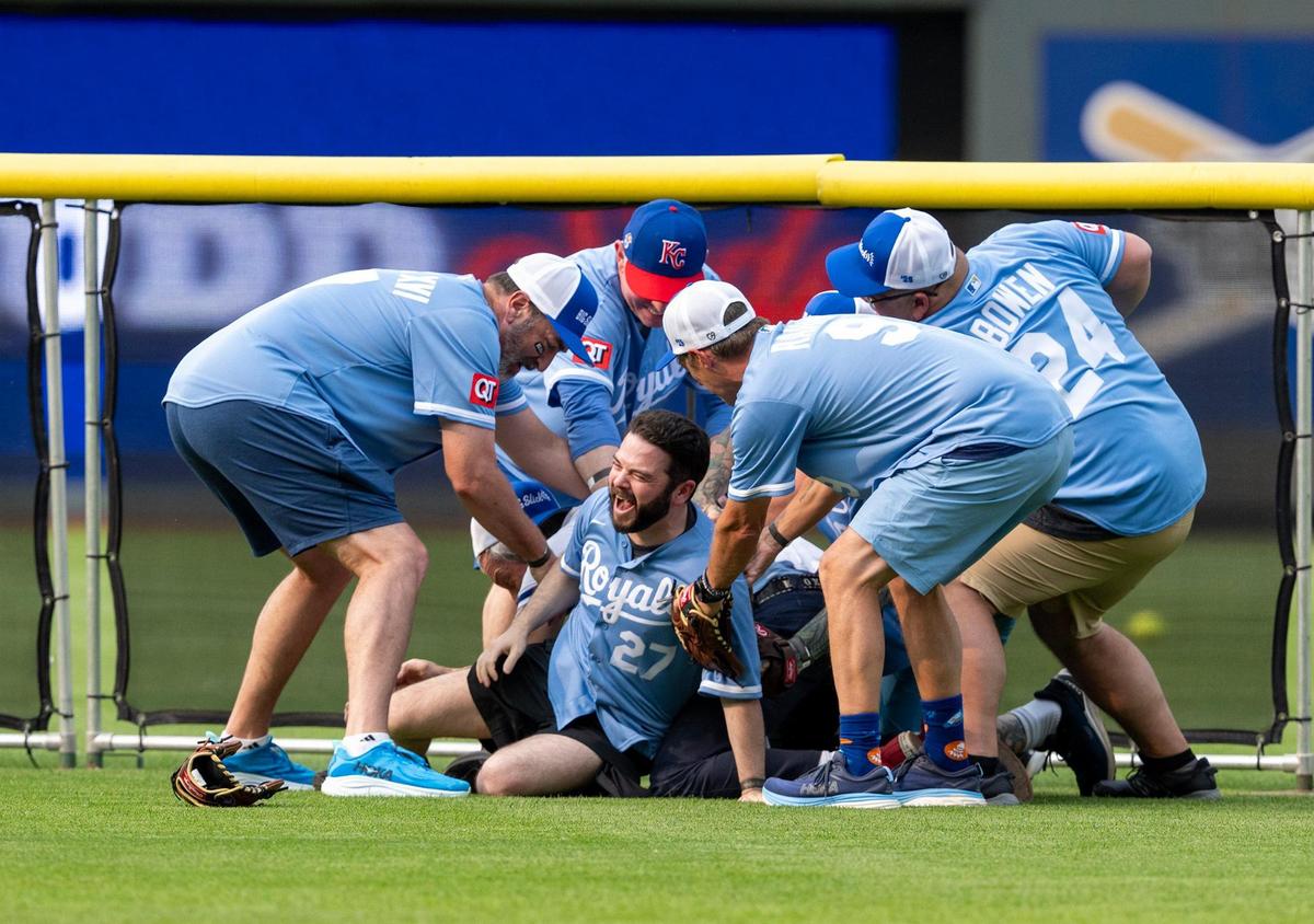 A brawl in the outfield during the Big Slick Celebrity Softball game on Friday, May 30, 2025, at Kauffman Stadium in Kansas City.