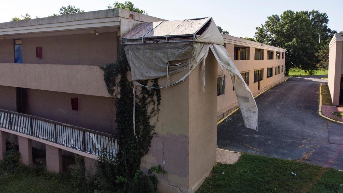 The closed Knights Inn motel at Shawnee Mission Parkway and Metcalf Avenue continues to deteriorate as it awaits demolition. The Overland Park City Council approved a plan to develop the land, but nothing has been done.