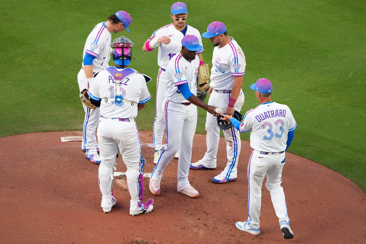 Kansas City Royals starting pitcher Luinder Avila hands the ball over to manager Matt Quatraro as he leaves the game against the Houston Astros in the first inning at Kauffman Stadium on June 12, 2026 in Kansas City, Missouri.