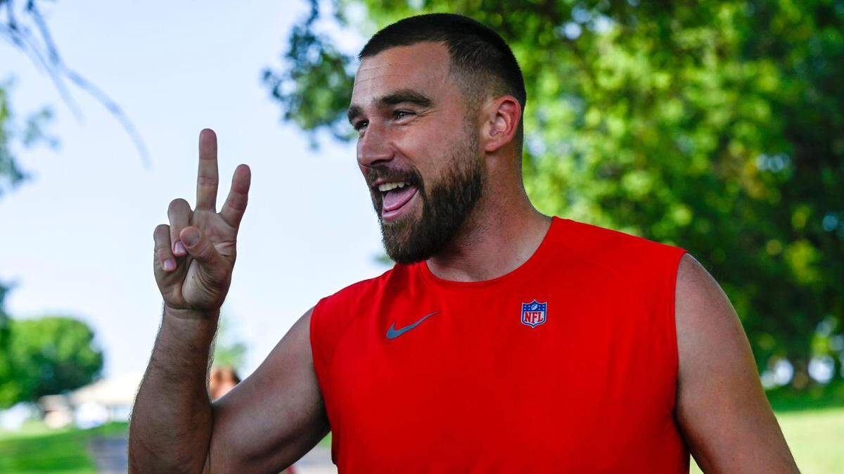 Chiefs tight end Travis Kelce greets fans during training camp at Missouri Western State University on Sunday in St. Joseph.