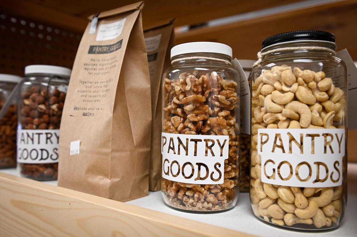 Nuts and other items are sold in bulk at Pantry Goods, 910 W. 39th St. The store specializes in minimal waste packaging. Customers choose their product and a container, such as a returnable glass jar or a compostable paper bag.