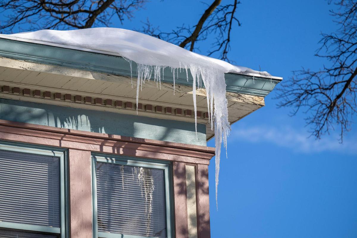 Icicles hang from the corner of a house rooftop on Monday, Jan. 6, 2025, in Kansas City.