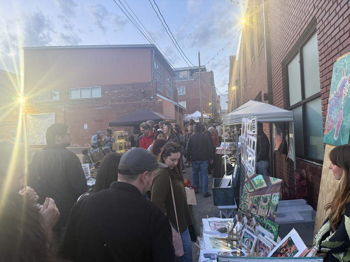 Visitors pack out the alleys in the Crossroads as vendors offer their goods during First Friday on May 1, 2026, in Kansas City, Missouri.