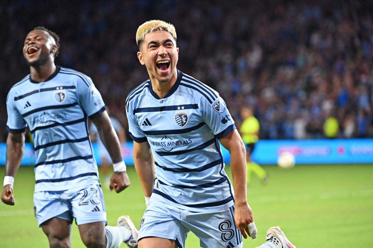 Sporting Kansas City midfielder Memo Rodriguez, right, celebrates after scoring against FC Dallas on Sunday night at Children’s Mercy Park.