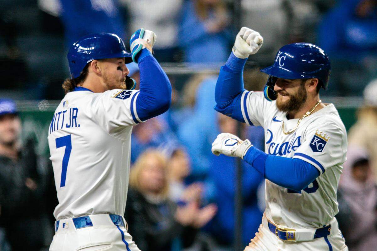Royals shortstop Bobby Witt Jr., left, celebrates with outfielder Kyle Isbel after the latter’s sixth-inning home run against the Minnesota Twins at Kauffman Stadium in Kansas City on Monday, April 7, 2025.