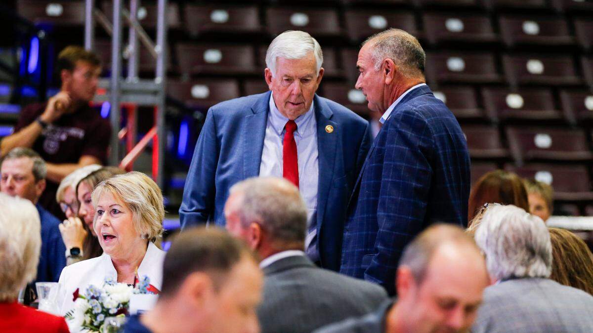 Missouri Gov. Mike Parson, left, and Gov-elect Mike Kehoe in Springfield in July 2024.