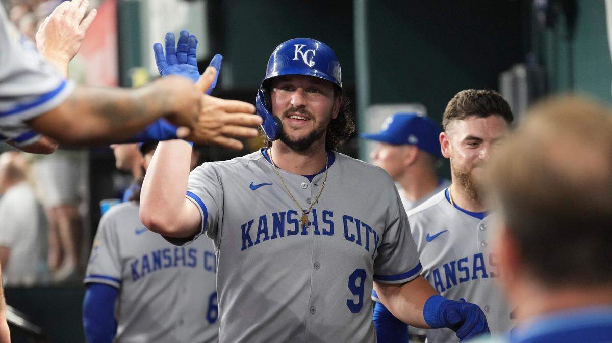 Kansas City Royals first baseman Vinnie Pasquantino (9) celebrates with teammates after scoring a run against the Texas Rangers during the fourth inning at Globe Life Field on June 17, 2025.