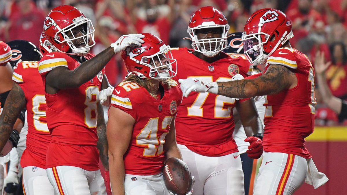Kansas City Chiefs running back Carson Steele (42) celebrates with teammates after running in a touchdown Thursday in the second quarter against the Chicago Bears.