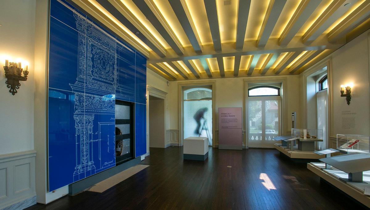 An original architectural drawing of a living room fireplace mantel, by Henry Hoit, was enlarged and printed on blue glass. The renovated Kansas City Museum devotes its first-floor galleries to R.A. Long and his family.